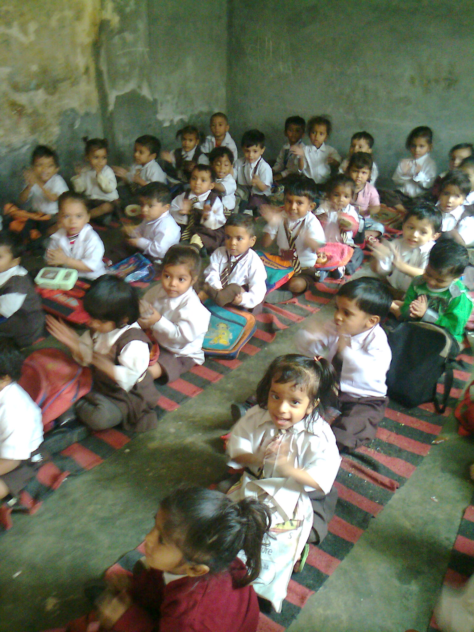 Children attending the school set up by Vidyaben at a Jehangirpuri slum in Delhi